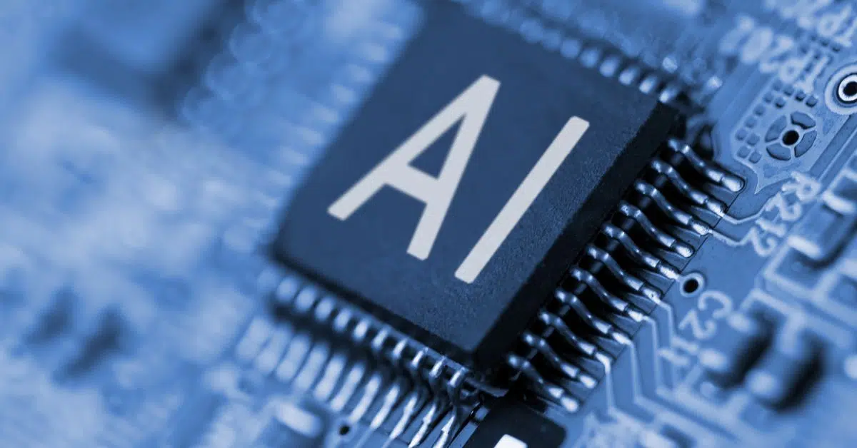 Close-up of an AI microchip on a circuit board, symbolizing the hardware foundation for AI software development.